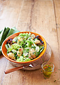 Green potato salad with peas, apple and herbs