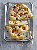 Focaccia with olives and cherry tomatoes