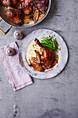 Slow roast duck legs with steamed sugar snaps