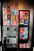 Sex worker cards in public phone box