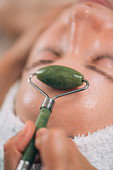 Jade stone roller face massage
