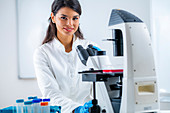 Researcher studying cell culture