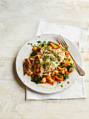 Chicken with crushed harissa chickpeas