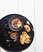 Baked camembert with pecans rosemary and olive oil toasts