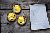 Hash brown, baked egg, and wilted spinach tart with hollandaise