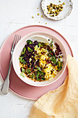 Black rice and saffron rice with labneh, chilli and vegetable stock