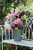 Fragrant late summer bouquet with phlox, hydrangeas, roses, bluebells, amaranth and annual fleabane