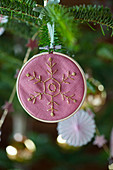 Christmas-tree decoration: embroidered snowflake in small embroidery frame