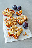 Autumn brookie (brownie with a cookie crust) with plums and walnuts