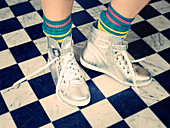 Colourful socks and high-top sneakers in silver