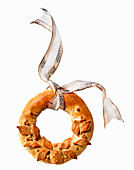 Decorative bread wreath with ribbon