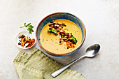 Cream of carrot soup with almonds