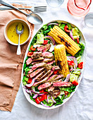 Healthy cumin-crusted steak salad