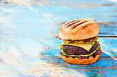 Vegan burger on a blue wooden background