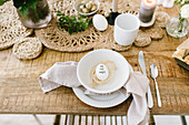 Set Easter table in natural colors