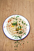 Hummus with parsley and sesame seeds