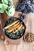 Kale with sausages and lentils