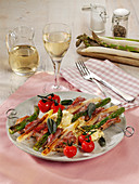 Asparagus and veal skewers with polenta