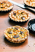 Carrot tartlets with fairy ring mushrooms