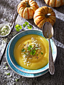 Pumpkin soup with fresh pepper, Parmesan and coriander