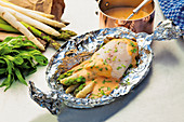 Asparagus and fish parcels with choron sauce