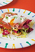 Toast with lettuce, ham and poached egg