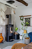 A wood-burning stove in a rural-style living room