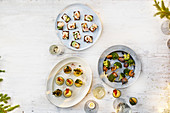 Canapes - Roasted salmon rye toasts, Curried parsnip soup shots, Sesame chicken and prawn skewers