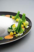 Broccoli, preserved gooseberries, rice cream and peanut butter
