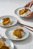 Curried fish with coconut rice
