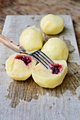 Stuffed potato dumplings with lingonberries
