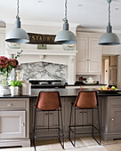 Pendant lights above kitchen breakfast bar