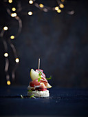 Canapes with prosciutto and pear
