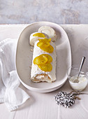 Snow roll with whipped cream and lemon