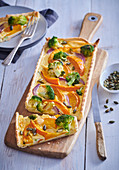 Quiche with pumpkin, red onion and broccoli