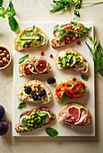 Various bruschettas with toppings