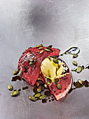Watermelon made in a Beefer with pumpkin seed oil and vanilla ice cream