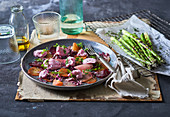 Beetroot carpaccio with herb espuma, chervil and grilled asparagus