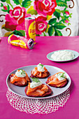 Graved lax on beetroot fritters with mozzarella cream