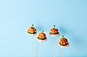 UFO finger food made from meatballs, sliced meat and cucumber