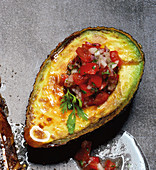 Grilled avocado with tomato and coriander salsa