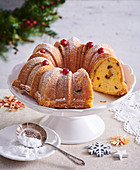 Poinsettia cake with cranberries and powdered sugar