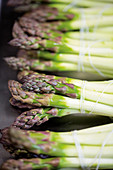 Green asparagus, peeled and bundled