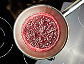 Redcurrant juice being boiled