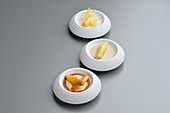 Variations of white asparagus with chicken and coffee jus