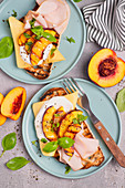 Sandwich with grilled peach and ham