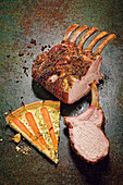 Pork rack with orange pepper and herb and carrot quiche