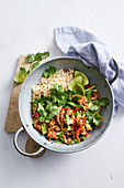 Ginger pork stir-fry with snow peas, cabbage and almonds