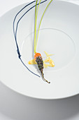 A carrot with poppyseed and orange cream