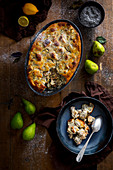 Scheiterhaufen (bread bake with apples, cinnamon, raisins and almonds) with poppyseeds and pears